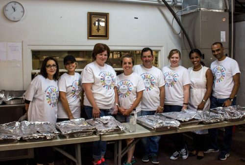 Loews New Orleans team members along with General Manager Mohan Koka serving on June 21, 2016 at the New Orleans Mission.
