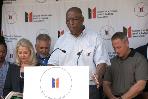 Leroy Perry, New Orleans Mission, conducting opening prayer.